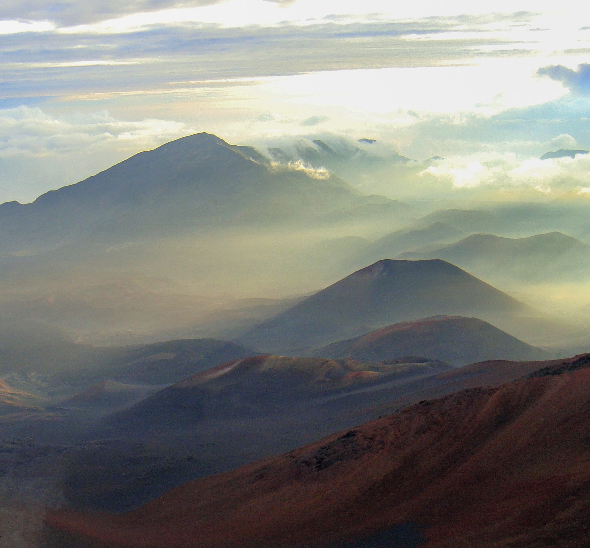 Remote mountain village shrouded in fog and mist