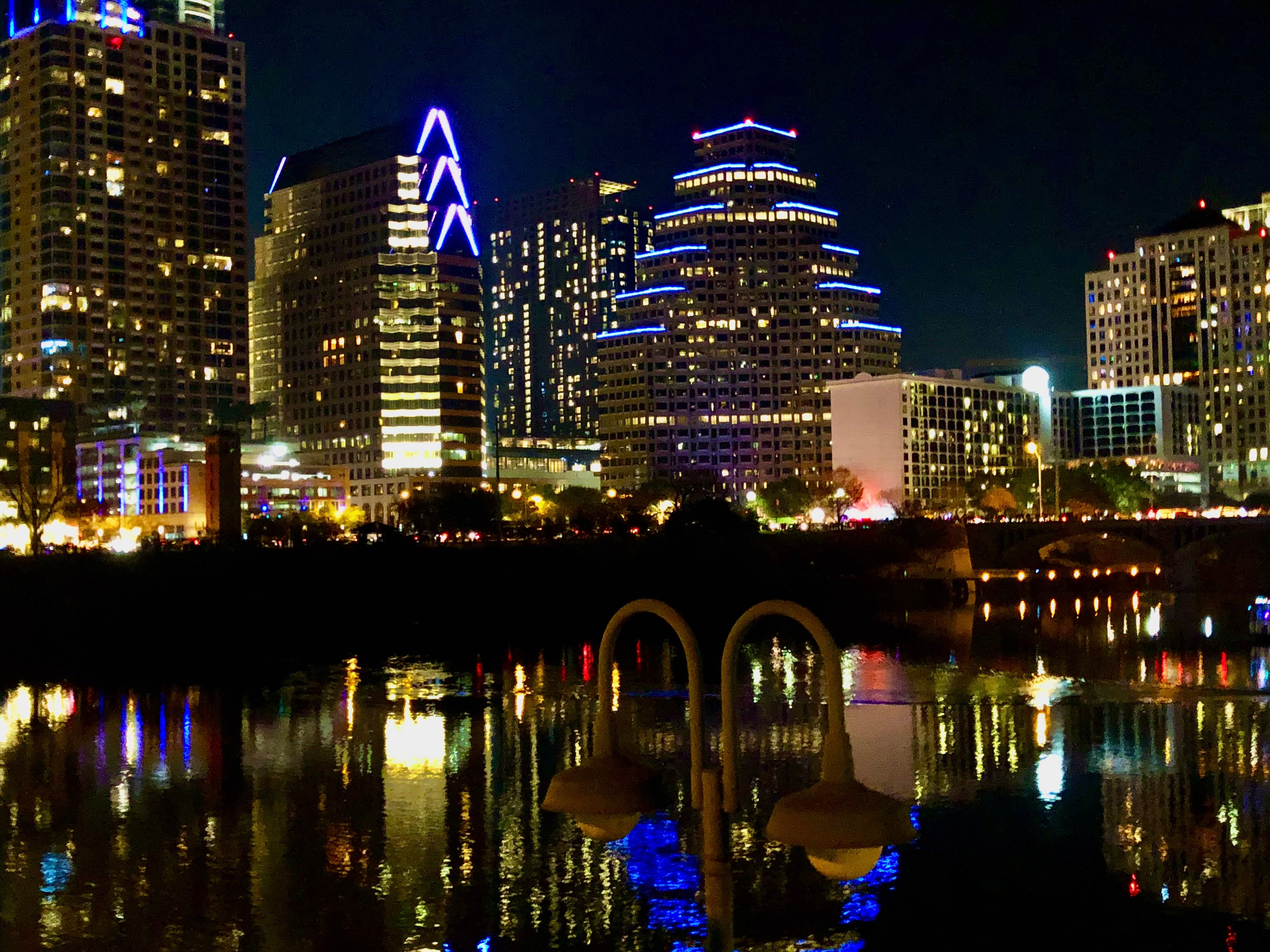 Iconic city bridge at blue hour with long exposure light trails